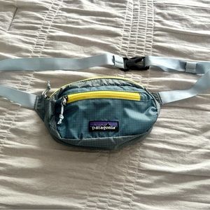 Patagonia Ultralight Black Hole Mini Hip Pack Blue and Yellow